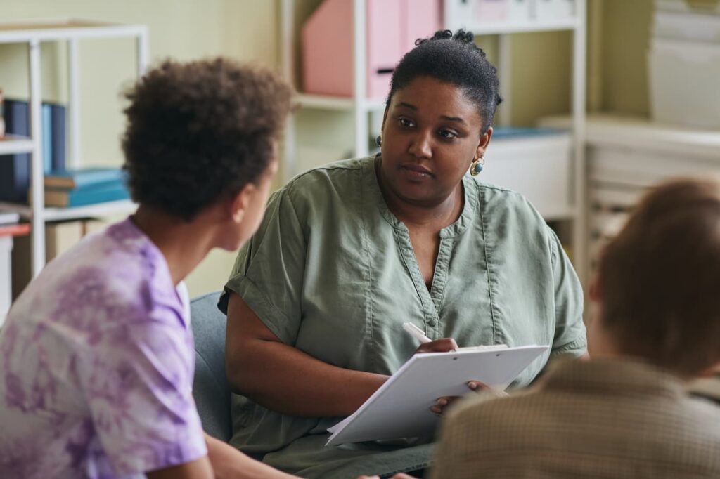 A woman receiving aftercare support and services in New Jersey
