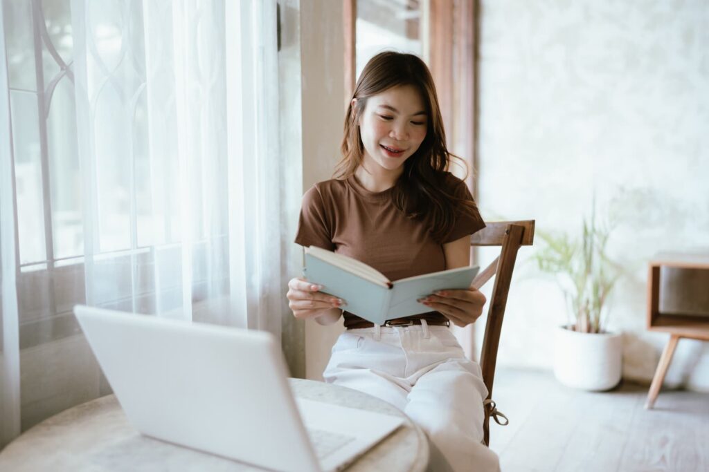 Woman reading after getting prescription drug addiction treatment in NJ