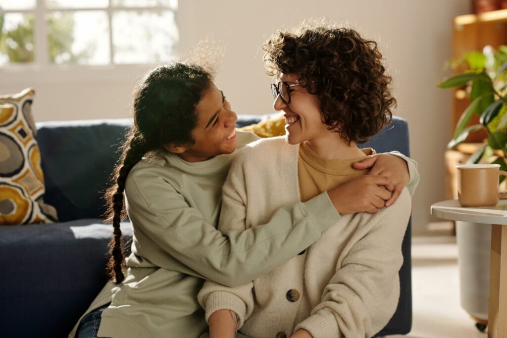Teen and her mom happy after she received teenage anxiety treatment in New Jersey